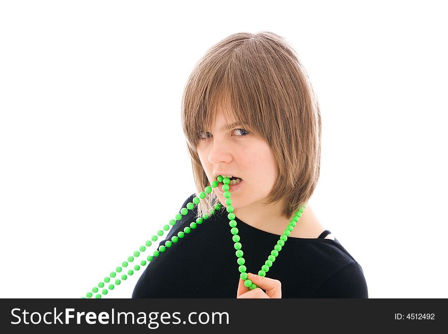 The young beautiful girl with a beads isolated on a white background