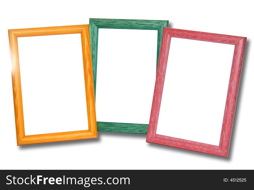 Colored wooden frames on white background
