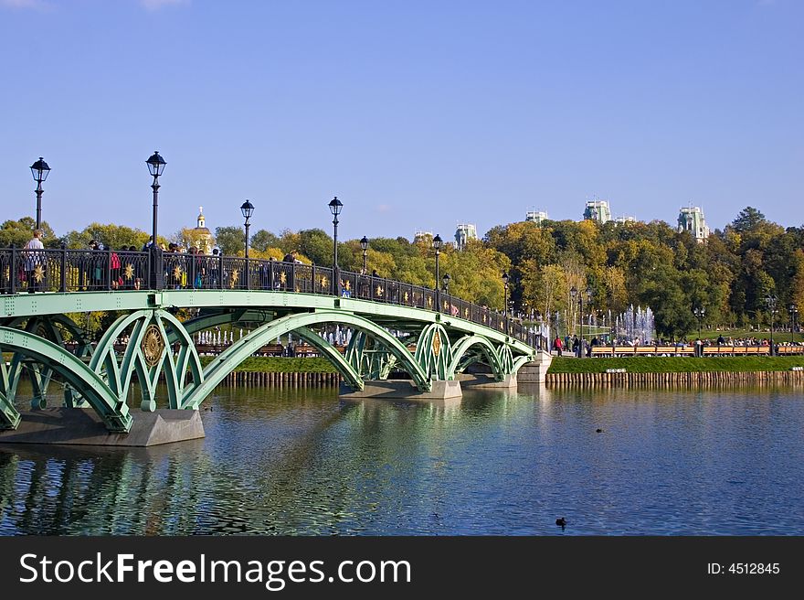 The bridge in autumn park. The bridge in autumn park.