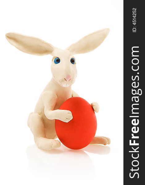 Easter rabbit with red egg