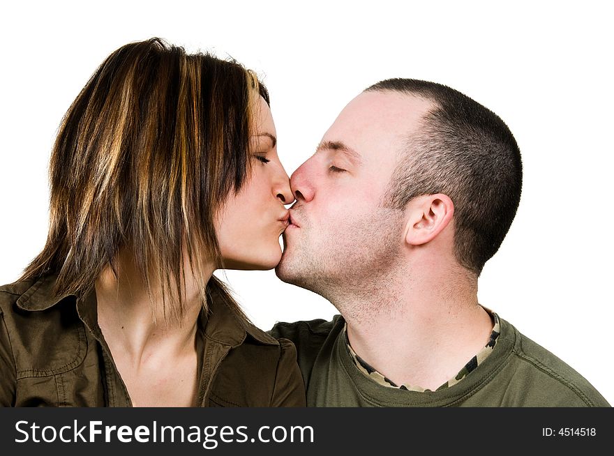 Kissing couple in love on isolated white