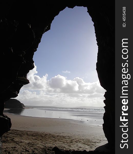 Looking out to the sea from a cave in Ireland. Looking out to the sea from a cave in Ireland