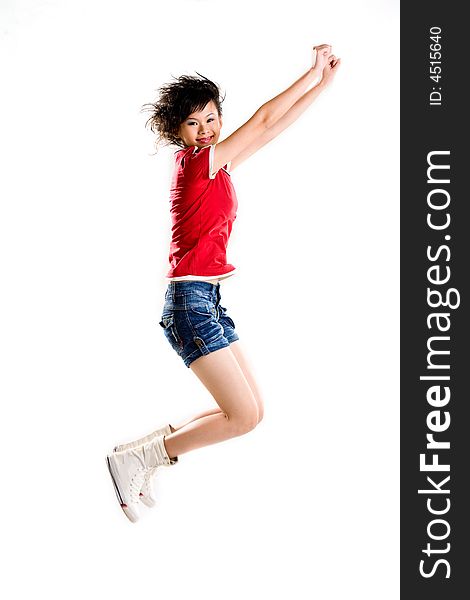 Happy jumping teenage girl stretching arms. Happy jumping teenage girl stretching arms