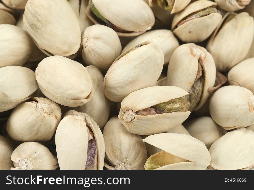 Close-up of fresh pistachio nuts for backgrounds