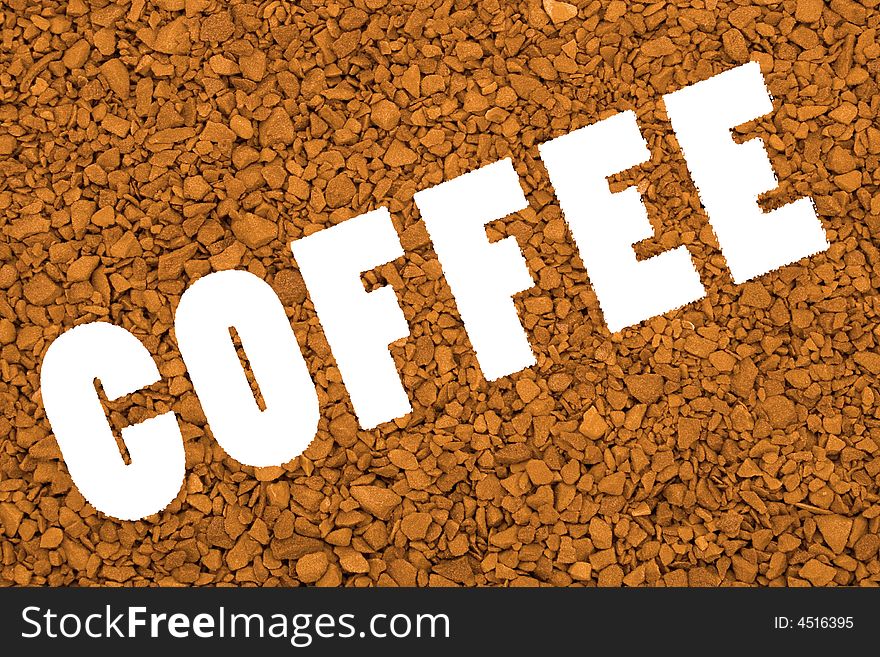 Word Coffee on brown granular background