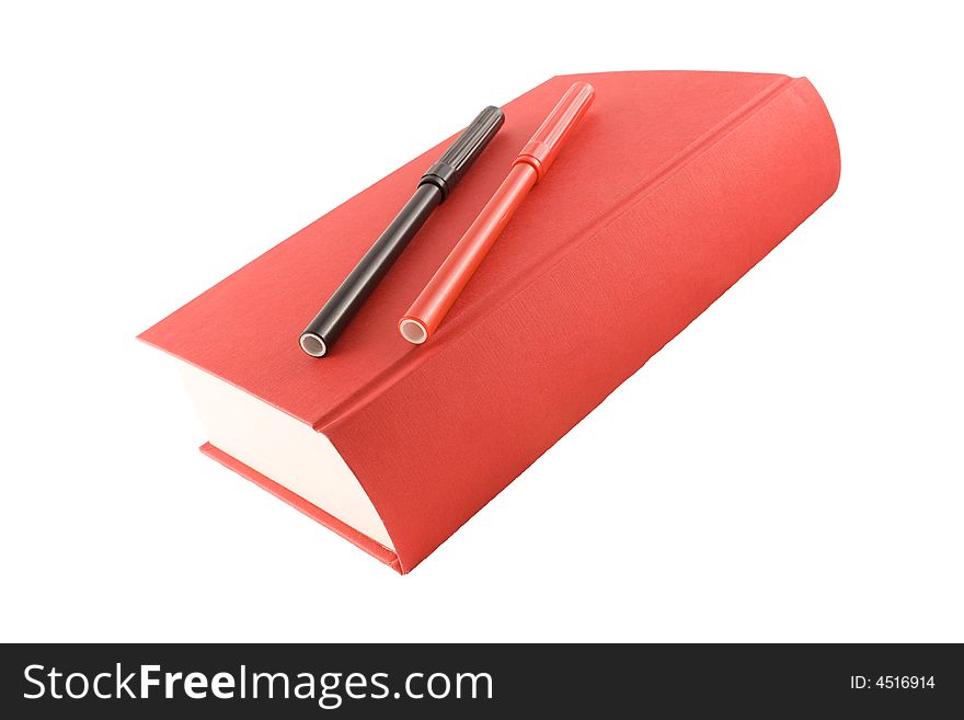 Red book and markers isolated on a white background