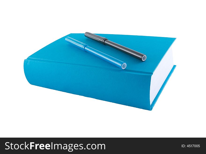 Blue book and markers isolated on a white background. Blue book and markers isolated on a white background