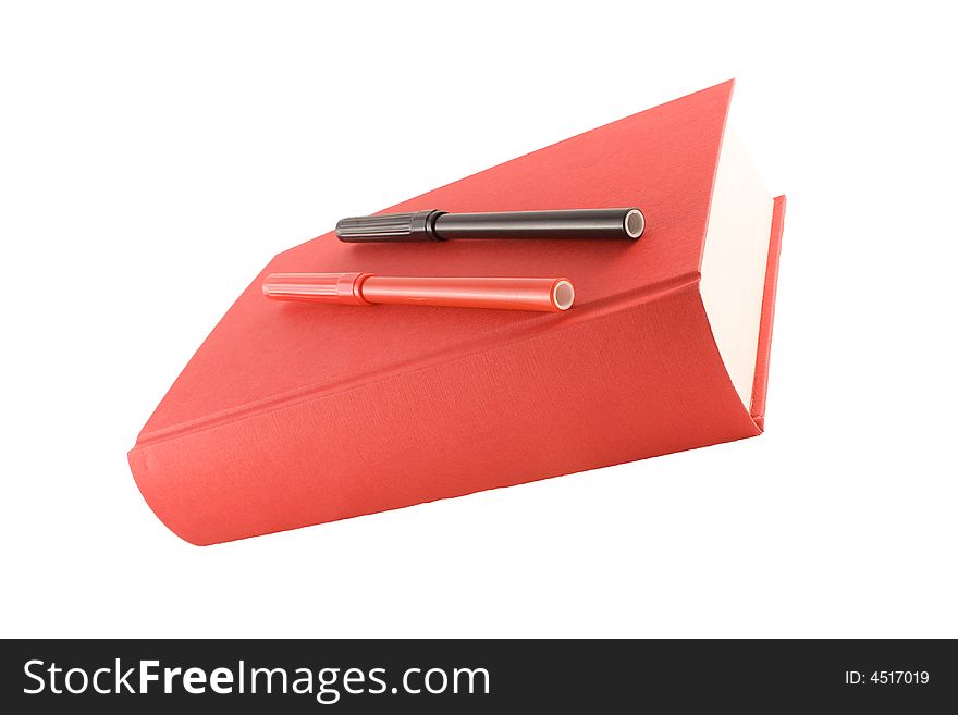 Red book and markers isolated on a white background. Red book and markers isolated on a white background