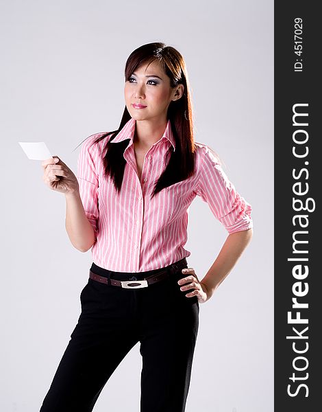 Confidence business woman giving business card. Confidence business woman giving business card