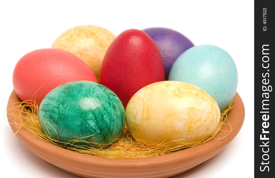 Easter colored eggs on a plate. Easter colored eggs on a plate.