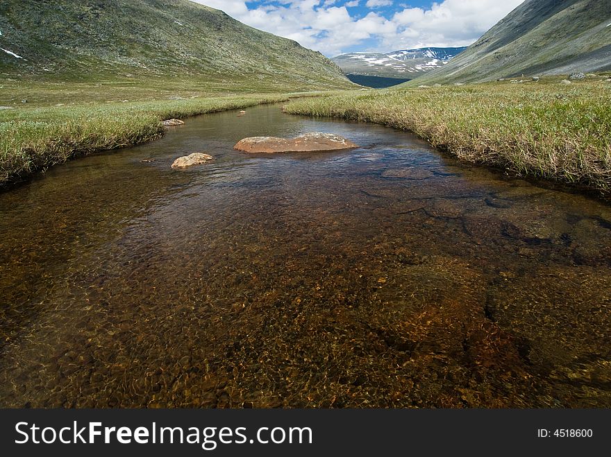 Wide angle photo of a mountain stream. Wide angle photo of a mountain stream