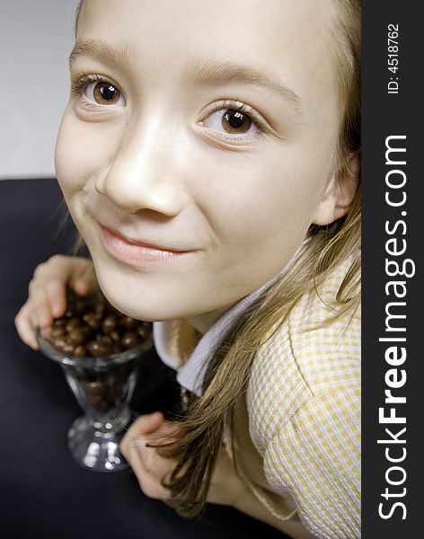 Young Girl Eating Candy