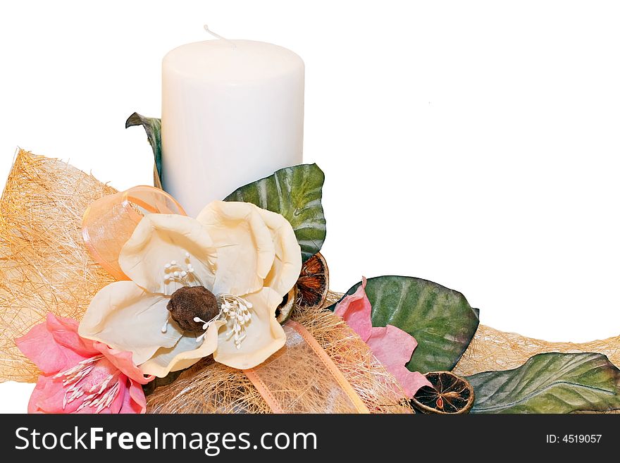 Candle and floral decoration isolated on white. Candle and floral decoration isolated on white