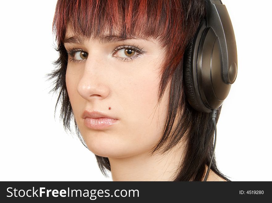 The young woman in ear-phones. The young woman in ear-phones