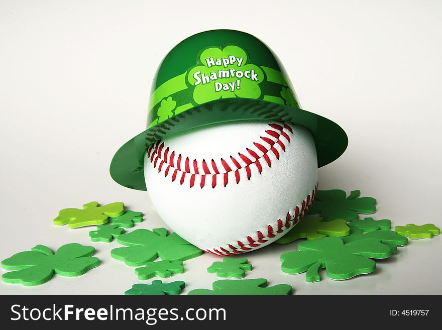 Baseball with green derby in shamrocks. Baseball with green derby in shamrocks