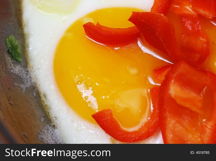 Omelette with sweet red peppers background. Omelette with sweet red peppers background