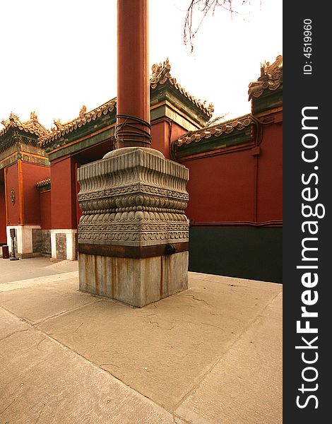 It is in the Lama Temple of Beijing of China. It is called flagpole stone for fixed flag. The flagpole is usual about ten meters high.