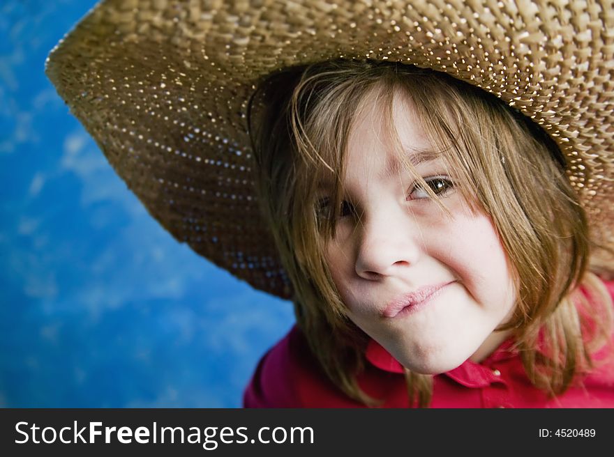 Little Girl With A Straw Hat