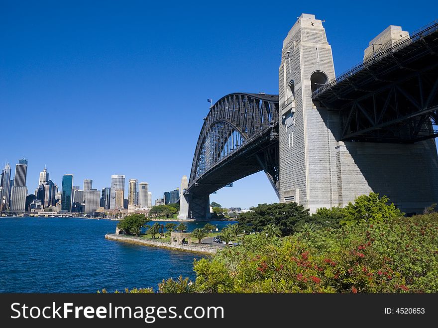 Sydney Harbour (harbor) Bridge and City on a perfect day with clear blue sky. Sydney Harbour (harbor) Bridge and City on a perfect day with clear blue sky