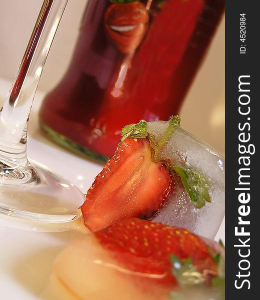 Strawberry in an ice for a cocktail