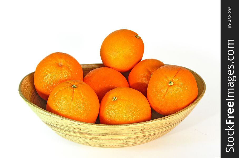 Wooden bowl with China orange over white background. Wooden bowl with China orange over white background