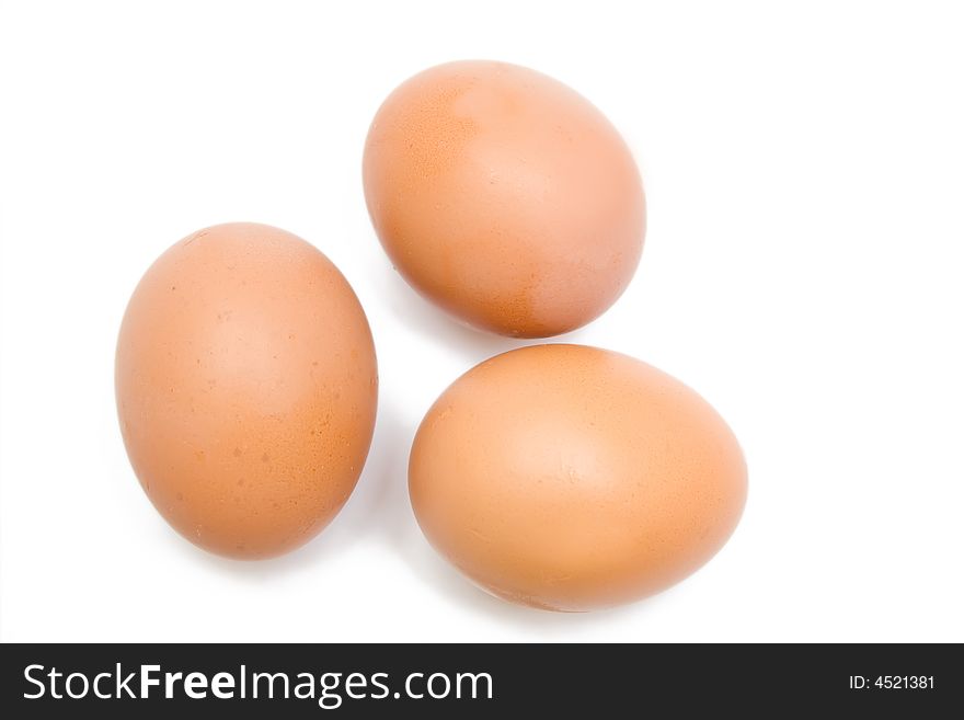 Three eggs on the white isolated background