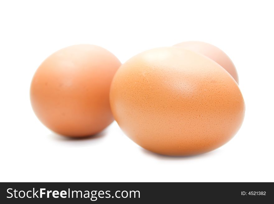 Three eggs on the white isolated background