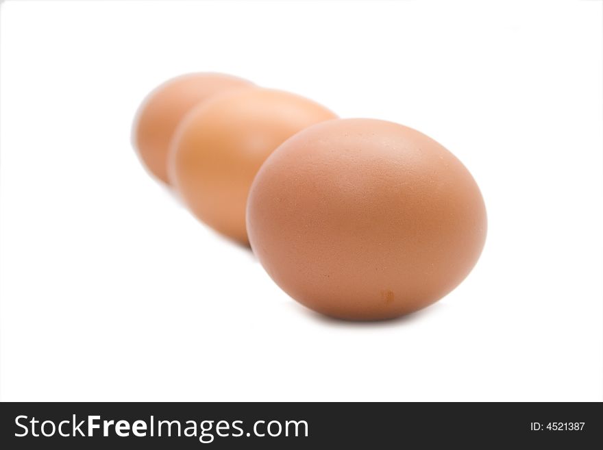 Three eggs on the white isolated background