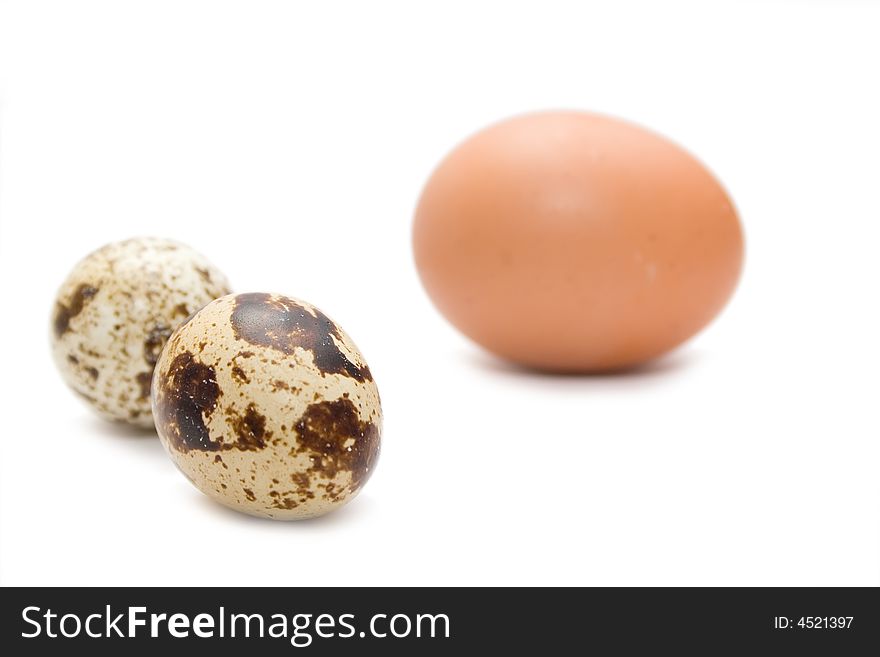 Three eggs on the white isolated background