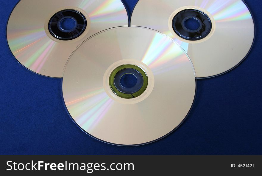 Three cd-rom like a stylized mouse face