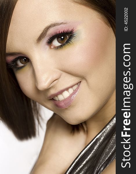 Beautiful glamor brunette model with colorful make-up. Beautiful glamor brunette model with colorful make-up