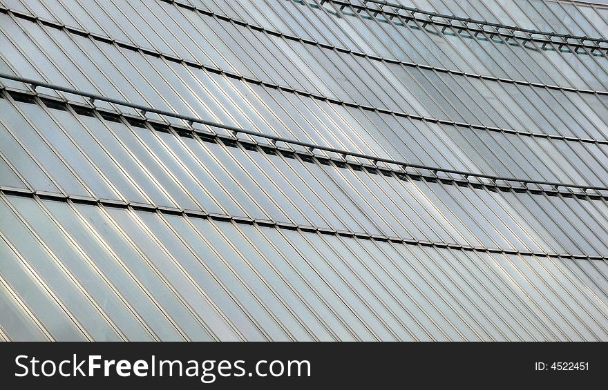 Glass facade of the greenhouse of a hospital. Glass facade of the greenhouse of a hospital