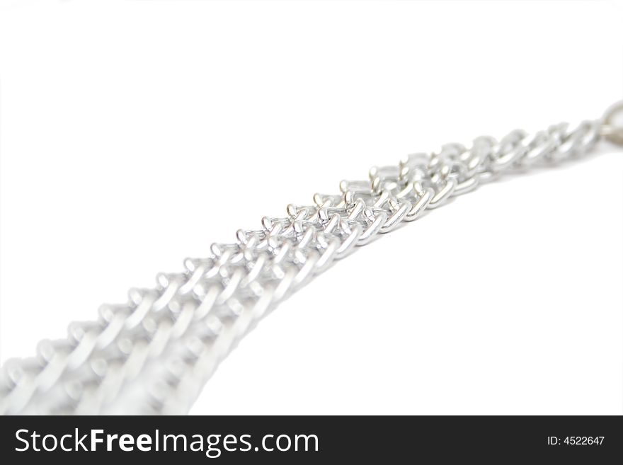 Fragment of silver chain on the white isolated background