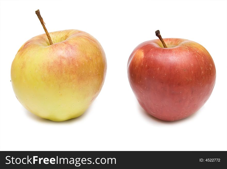 Red and yellow apple on the white isolated background