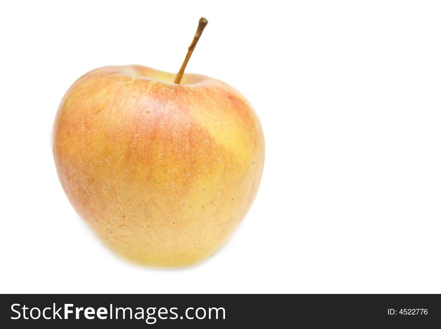 Yellow apple on the white isolated background