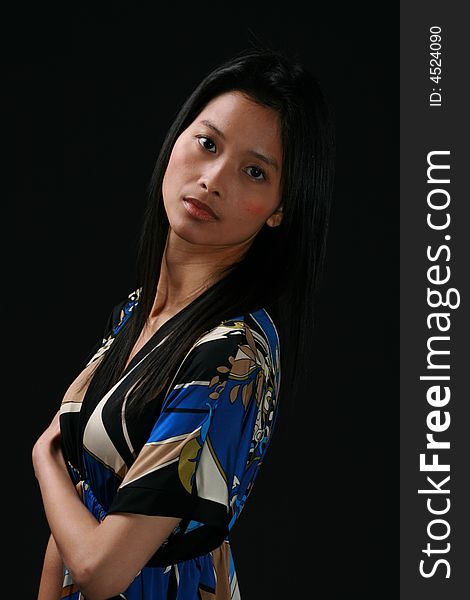 Portrait of young Asian beauty wearing a patterend blouse. Portrait of young Asian beauty wearing a patterend blouse