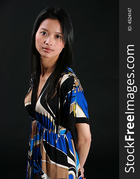 Portrait of young Asian beauty wearing a patterend blouse. Portrait of young Asian beauty wearing a patterend blouse