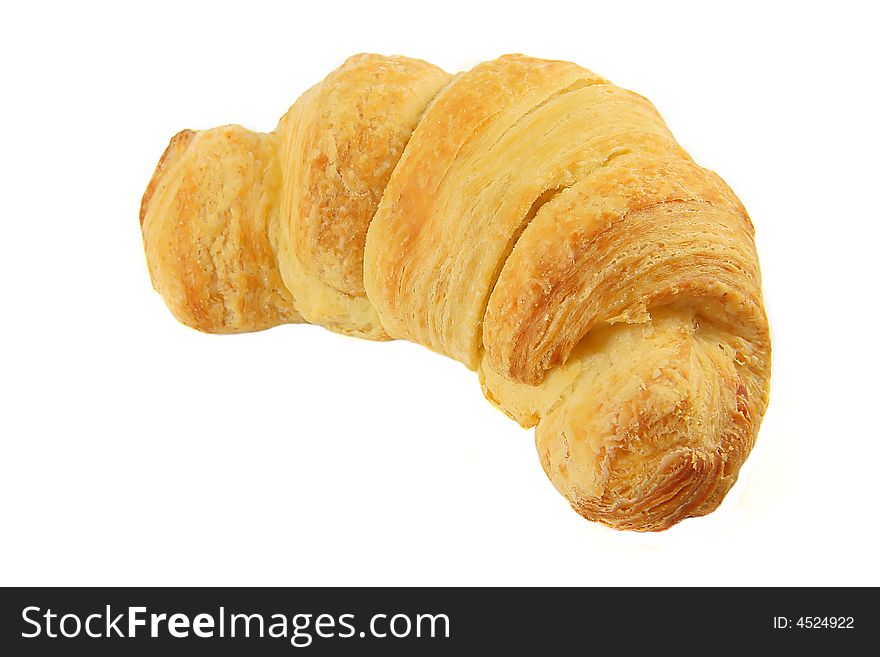 A fresh butter croissant isolated on white