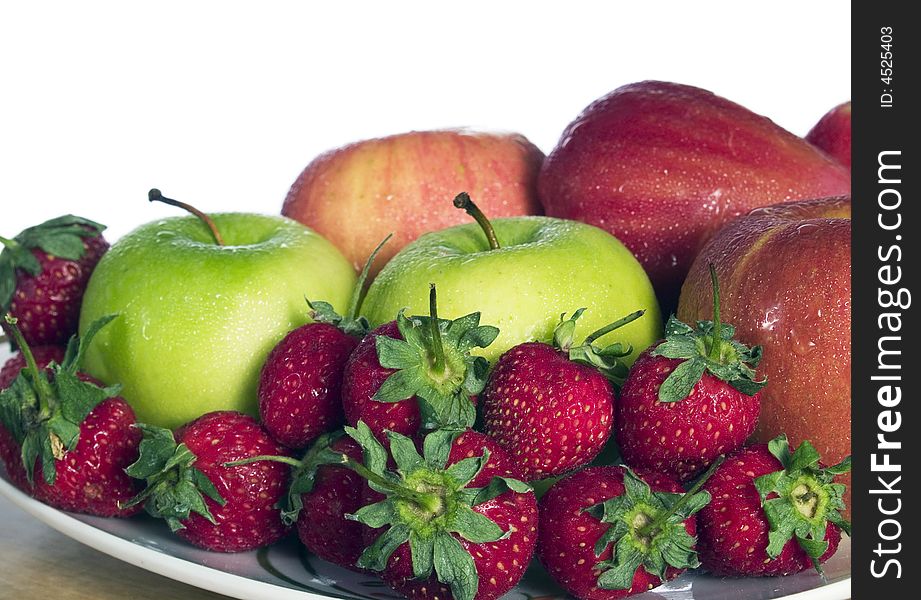 A plate of fruits with white background