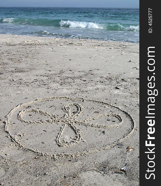 Flower drawing on the white sand. Flower drawing on the white sand