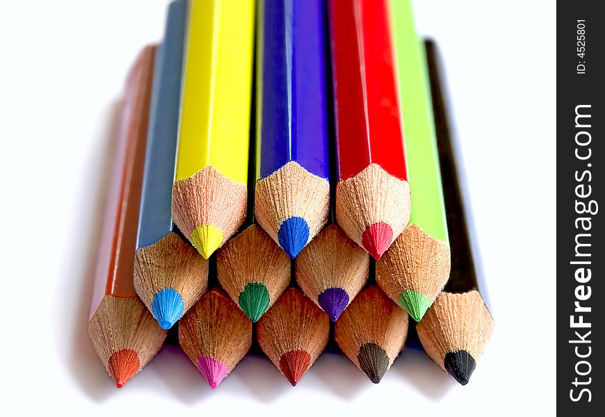 Colors over white in stacked pencil composition. Colors over white in stacked pencil composition