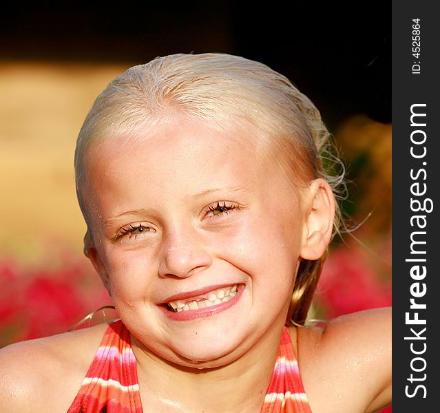 Little Girl Smiling After Swimming in the Summer. Little Girl Smiling After Swimming in the Summer