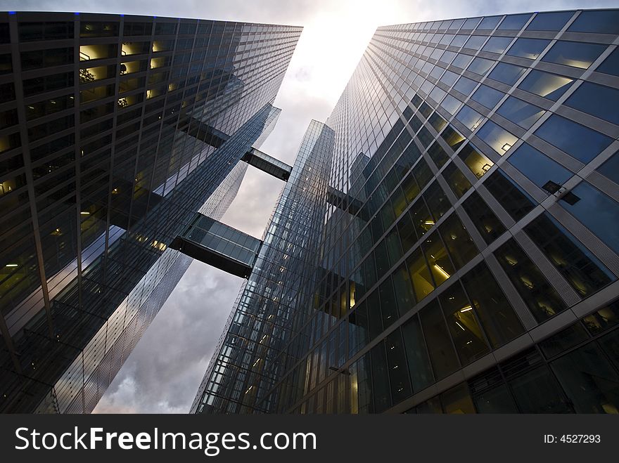 Modern bureau building in munich, germany, reflecting steel facade