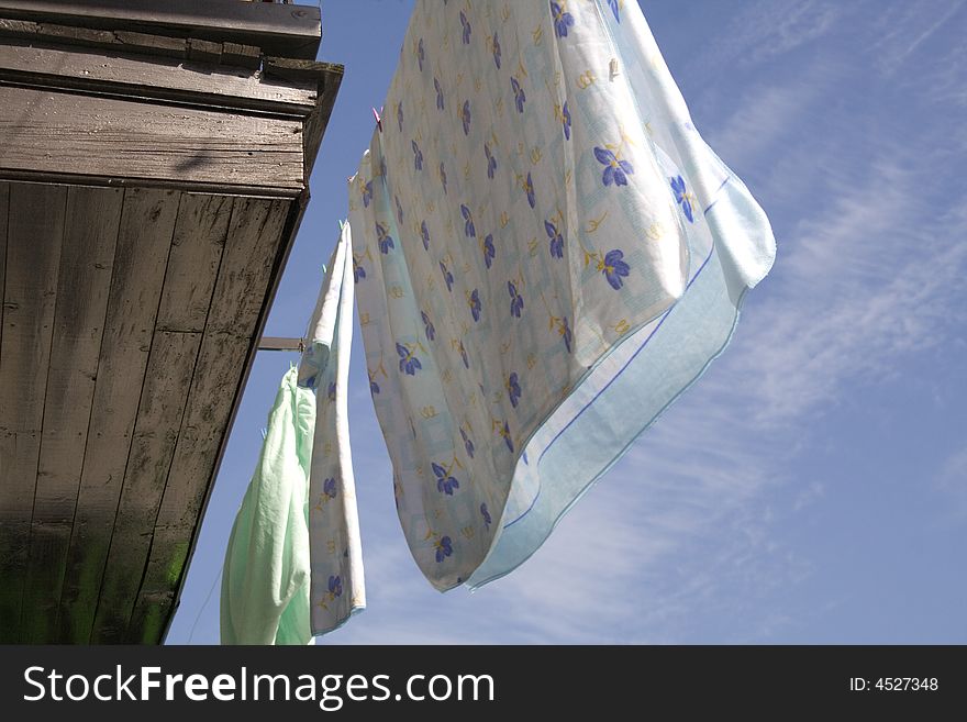 Sheets hanged out from balcony