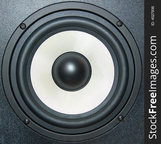 Audio equipment  with a light diaphragm in a black musical column.