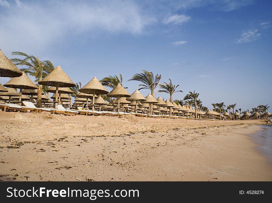 Egyptian Beach awaiting visitors to make use of the sun beds and umbrellas ;-). Egyptian Beach awaiting visitors to make use of the sun beds and umbrellas ;-)