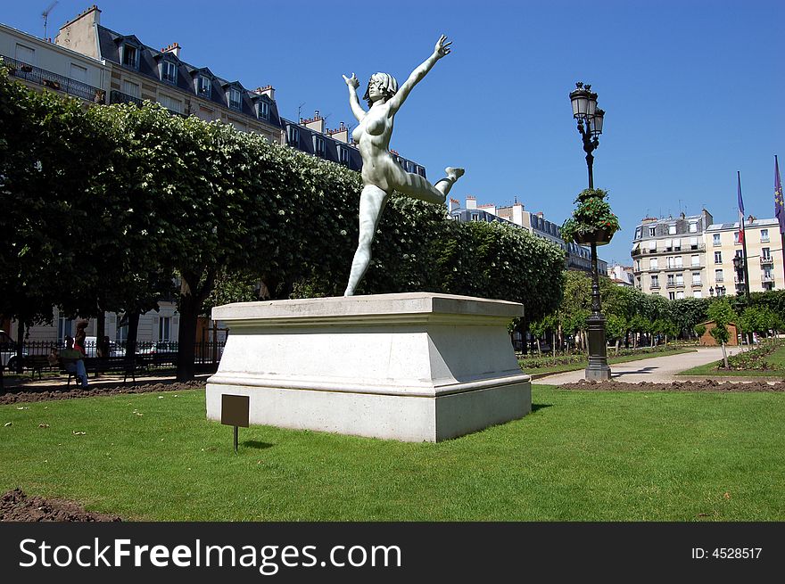 A computer generated statue of a dancing woman inserted in a real photography on a real pedestal. Ideal for illustrating freedom or the act of dancing. A computer generated statue of a dancing woman inserted in a real photography on a real pedestal. Ideal for illustrating freedom or the act of dancing.