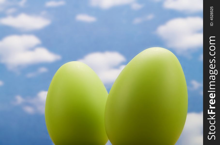 Easter eggs over a blue sky