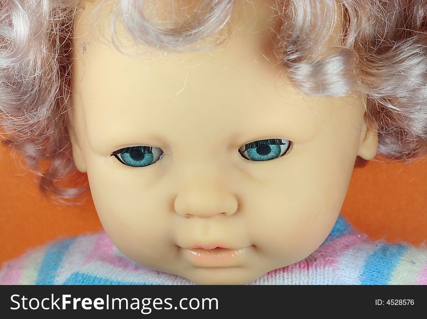 Plastic doll with blue eyes