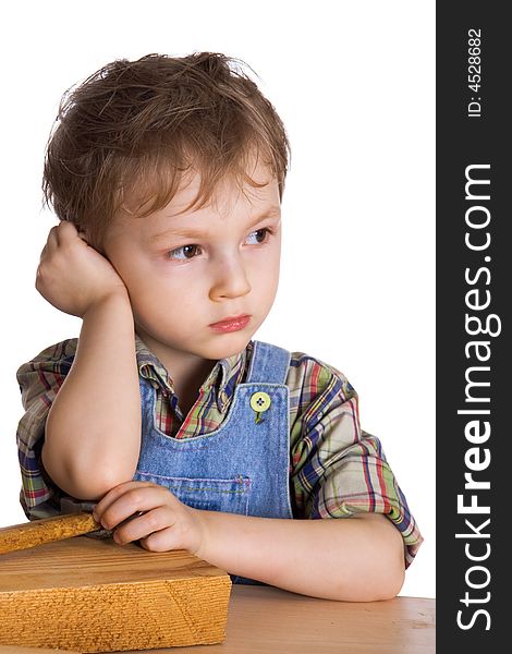 Small tired boy on a white background. Small tired boy on a white background